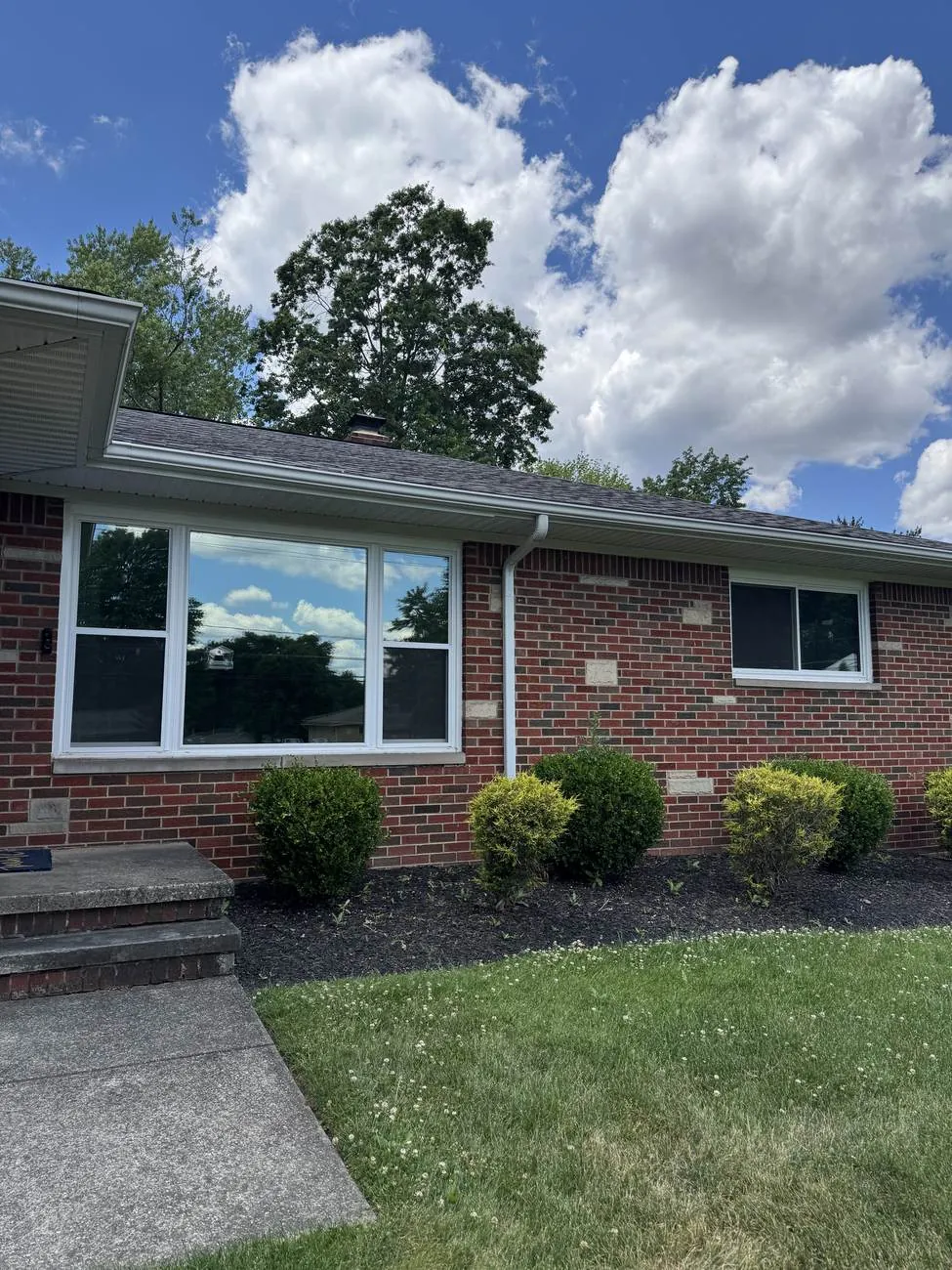 Brick ranch home in Northeast Ohio with newly tinted picture windows